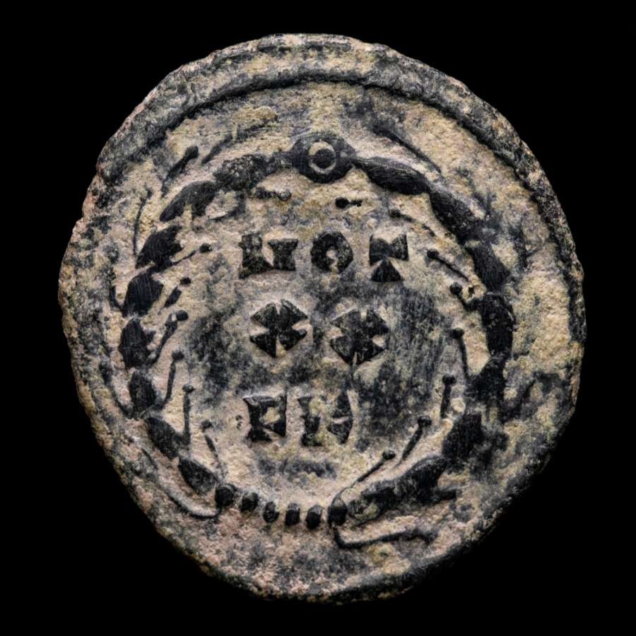*Lucernae* Diocletian Follis fraction VOT XX FK wreath (3246) Cartago 303 AD.