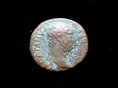 HADRIAN, 117-138 AD. AS. Roma stands right, left foot on helmet.