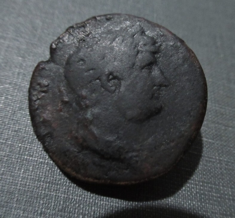 Hadrian Æ Sestertius Roma Seated on Cuirass, Holding Victory. 124-128 AD