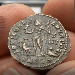 Ancient Roman Empire Coin Licinius I. 311-312 AD. Genius Holding Head of Sol